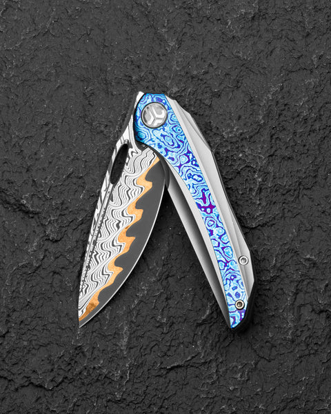 BESTECH SENU BT2601E Titanium with Timascus Inlays Handle: 3.48" Futuron Forge Elmax Core-Copper Line BoomBap pattern Damascus Blade Frame Lock