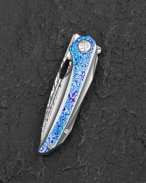 BESTECH SENU BT2601E Titanium with Timascus Inlays Handle: 3.48" Futuron Forge Elmax Core-Copper Line BoomBap pattern Damascus Blade Frame Lock