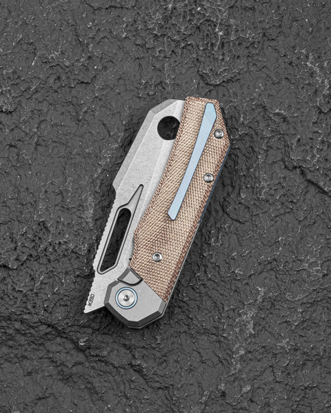 BESTECH NYRRDREKI BT2607A Titanium with Micarta Inlays Handle: 3.08" M390 Blade, Thumb Hole, Front Flipper with Button Bolster Lock, Hollow Grind