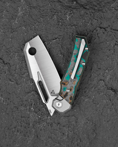 BESTECH NYRRDREKI BT2607C Titanium with Shipwreck Camo Carbon Inlays Handle: 3.08" M390 Blade, Thumb Hole, Front Flipper with Button Bolster Lock, Hollow Grind