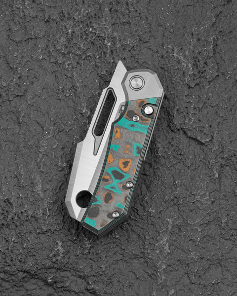 BESTECH NYRRDREKI BT2607C Titanium with Shipwreck Camo Carbon Inlays Handle: 3.08" M390 Blade, Thumb Hole, Front Flipper with Button Bolster Lock, Hollow Grind